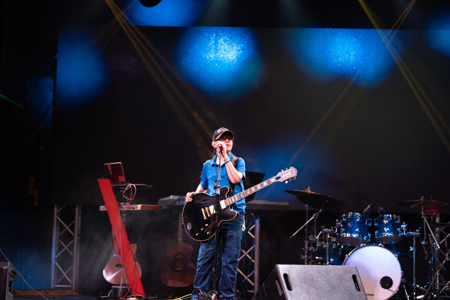 Holden Garcia performing live with his guitar